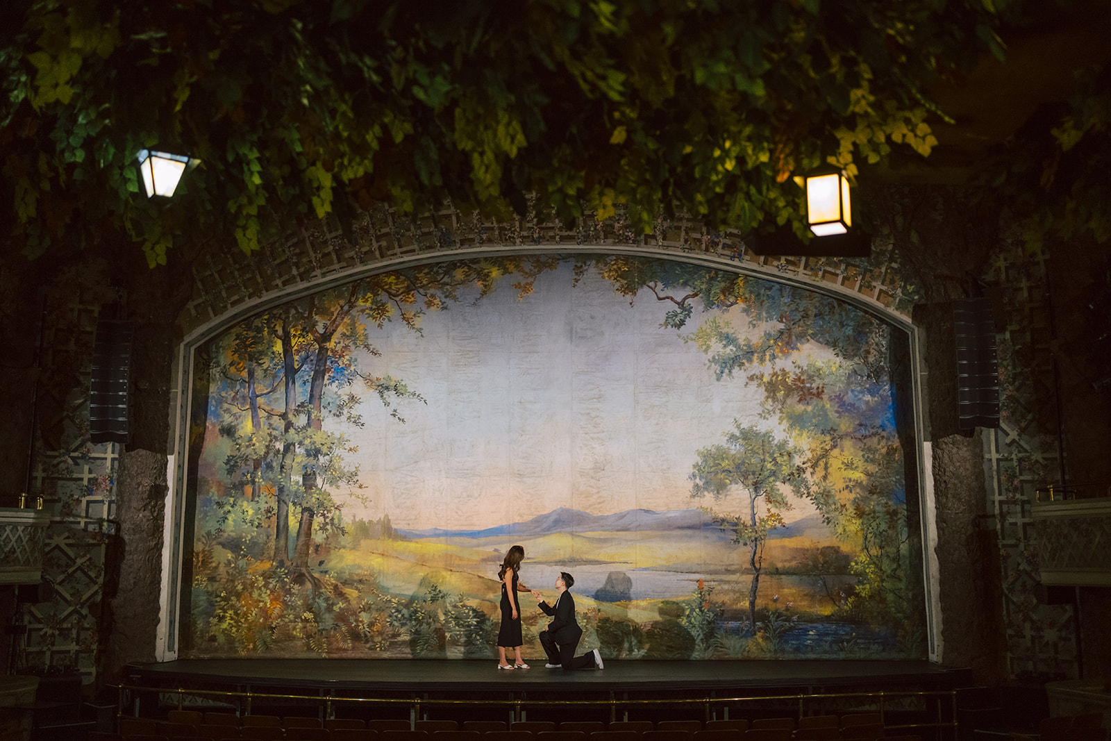 Bryan proposing to Sheryl on the theatre stage