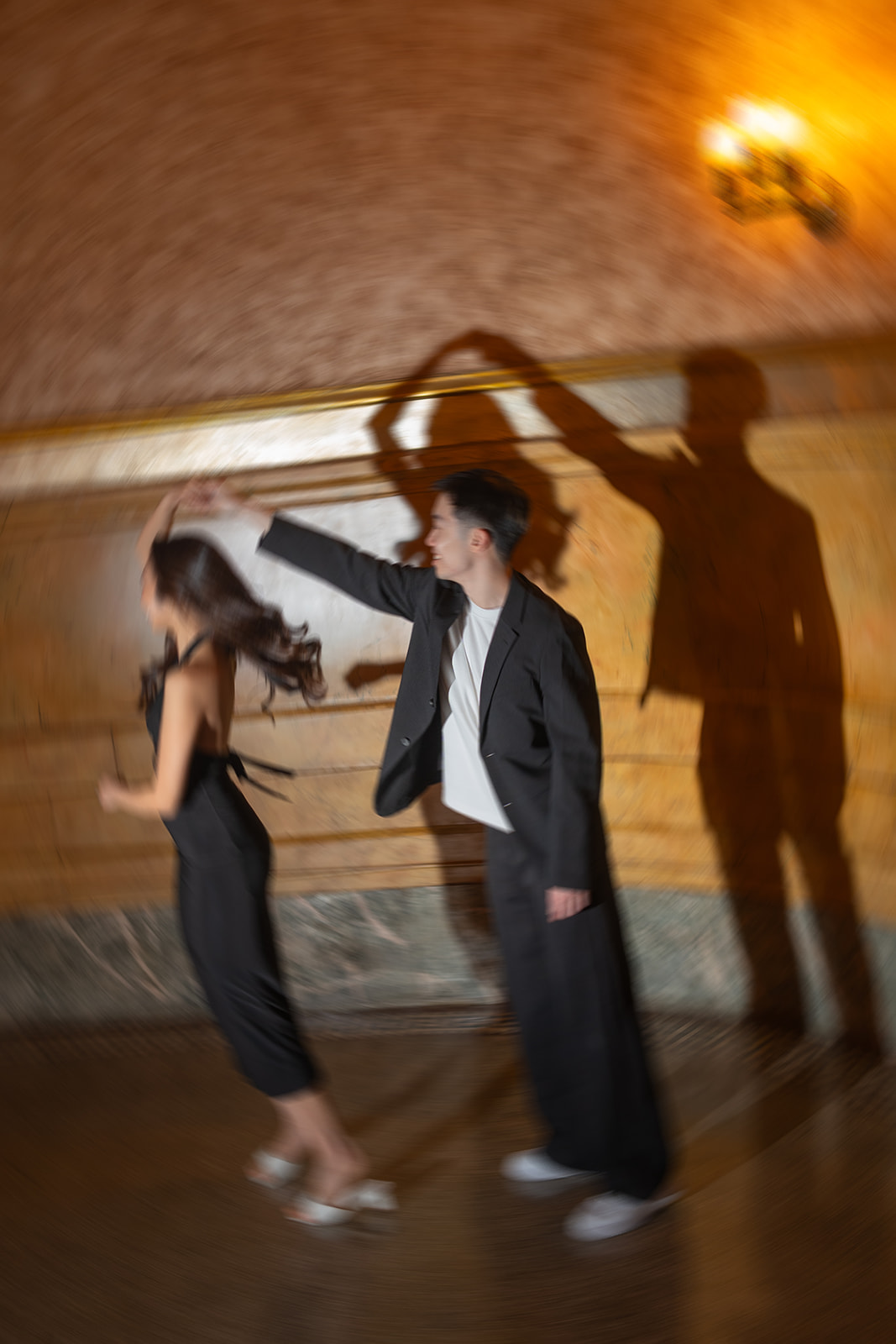 Bryan twirling Sheryl in the theatre